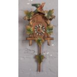 A cuckoo clock with weights