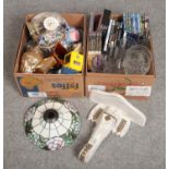 Two boxes of miscellaneous, to include clocks, decorative corbel, DVDs, Tiffany style lamp shade