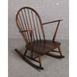 An Ercol spindle back rocking chair.