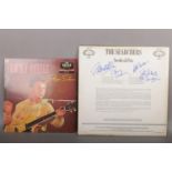 Two 1960s autographed LP records; The Searchers and Tommy Steele.