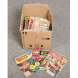 A box of Car Mechanics, The Practical Householder, Practical Motorist magazines.