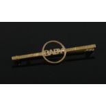 A 9ct gold bar brooch inscribed Baby, 42mm wide.