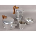Four pieces of stainless steel Picquot ware to include coffee pot, teapot etc.