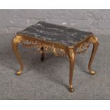 A gilt metal and marble effect occasional table, 45cm x 29cm, 32cm high.