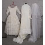 Two Vintage Wedding Dresses with lace detailing, to include floral tiara & veil.