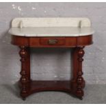 A Victorian marble top mahogany duchess washstand 91cm x 44cm, 72cm high. Good clean condition.