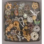 A good quantity of costume jewellery brooches, to include paste set examples.