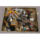 A collection of costume jewellery, beads, bangles, quartz wristwatches etc