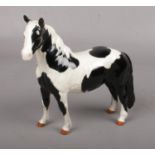 Beswick horse figure 'Pinto Pony' No. 1373 Piebald black & White, designer A. Gredington 16.5 cm