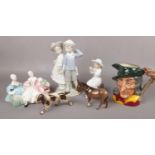 A collection of ceramic figures and animals. Lladro boy and girl, Royal Doulton the Love Letter,
