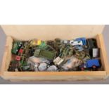 A box of vintage toys, to include Dinky, Lesney, lead figures etc.