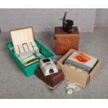 A boxed Uher Universal 5000 reel to reel tape player along with a Pathescope Ace projector, a
