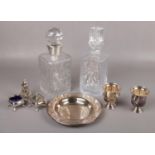 A cut glass decanter with silver collar, another decanter and a quantity of silver plate including a