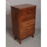 An oak chest of five drawers.