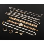 A small quantity of silver and dress jewellery. Including pearl necklace with silver gilt clasp,