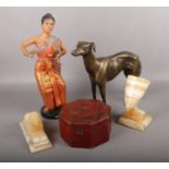 A group of decorative figures, to include cast metal greyhound etc. and Japanned octagonal work box.