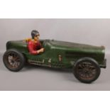 A large composite model of a vintage motorcar and driver, 70cm.