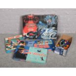 A Polistil Batman & Robin racing set, along with three other boxed vintage games and a collection of