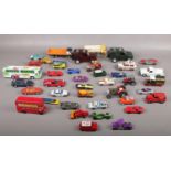A collection of die cast vehicles, Dinky, Corgi, Matchbox examples