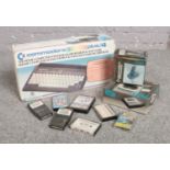 A boxed Commodore Plus 4 and accessories, to include Datassete 1531, 1341 Joystick and games.