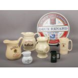 A collection of ceramic advertising Whisky jugs, The Glenlivet, Tullamore Dew, The Original