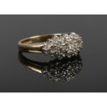 A 9ct gold diamond cluster ring. Size H 1/2.