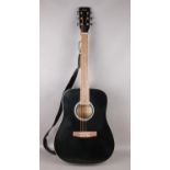 A Swift black accoustic guitar with rosewood fretboard. With soft case and strap.