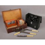 A mixed group to include small vintage suitcase, Tasco binoculars etc.