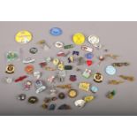 A collection of badges, Pond Hopper Club 2000, National Blood service, Girl Guides examples