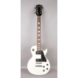 A Westfield electric guitar in Gibson Les Paul form. With rosewood fretboard, white finish with