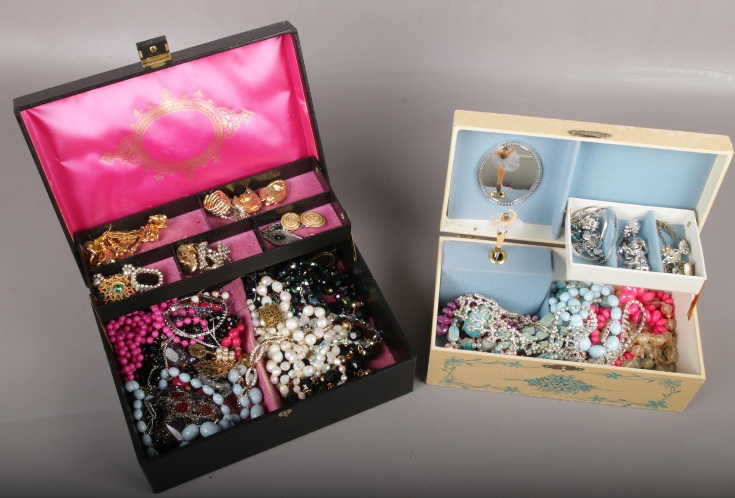 Two boxes of costume jewellery to include rings, beads, necklaces, earrings, brooches, etc.