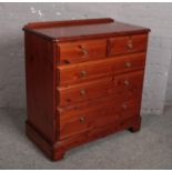 A modern pine Ducal two over three chest of drawers.