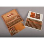 A set of 25 Willem II Chicas Corona cigars along with another part used Jamavana box of cigars.