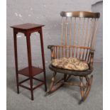 A spindle back rocking arm chair along with a mahogany two tier jardinière stand.