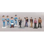 A collection of The Beatles lead and plastic figures, to include Corgi Rita meter maid.