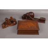 A carved wooden jewellery box, to include two wooden decorative wares