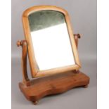 A Victorian mahogany toilet mirror.