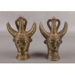 Two gilt metal Benin style busts of tribesmen.