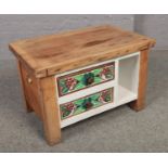 A part painted oak and pine cabinet with two drawers.