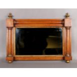 An early 19th century birds eye maple and parcel gilt small over mantel