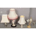 Four table lamps to include figural example etc.