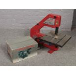 A Sealey electric 12inch band saw and belt sander, along with a boxed 6inch bench grinder.