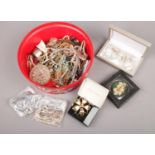 A box of costume jewellery, to include brooches, simulated pearls, pendants etc.