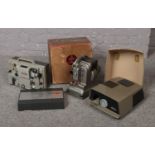 A boxed Bolex Paillard projector, along with and Aldis projector and a Eumig Mark S projector.