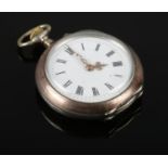 A continental silver fob watch with white enamel dial and Roman numeral markers, stamped 800.