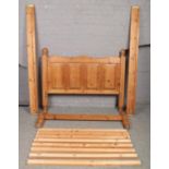 A pine double bed frame.