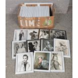 A box of framed print photographs of actors/actresses from early black and white films.
