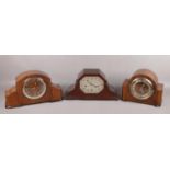 Three walnut cased 8 day mantel clocks with Westminster chime. Including Enfield and Garrard