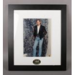 A framed autographed Steven Seagal display.