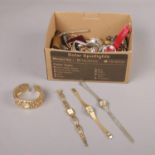 A collection of costume jewellery, necklaces, brooches, quartz wristwatches, Accurist, Limit